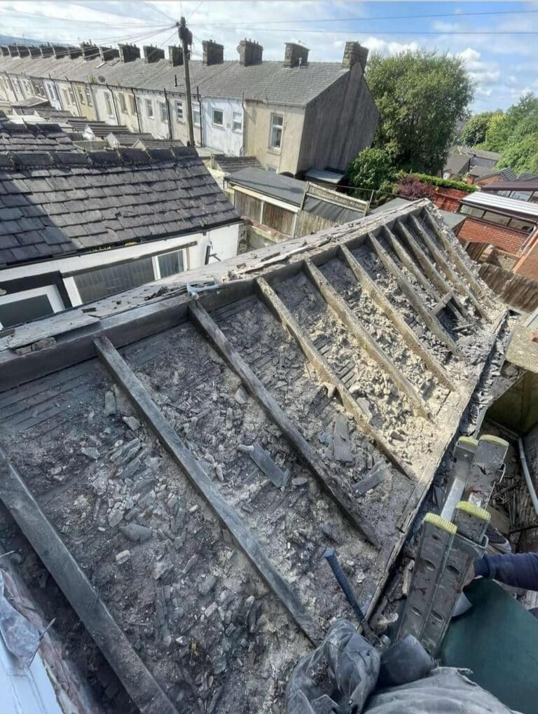 Old slate roof stripped back during a re-roof