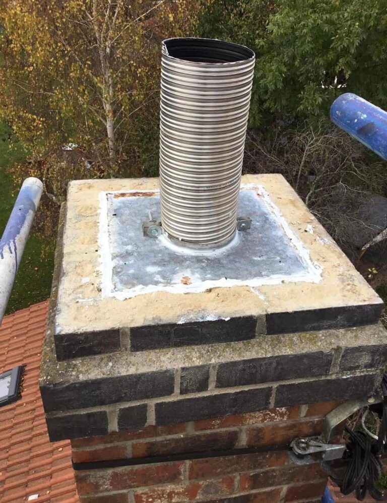 Chimney with new lead flashing and flue